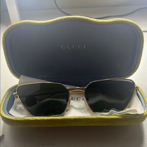 Gucci Black and Gold Sunglasses